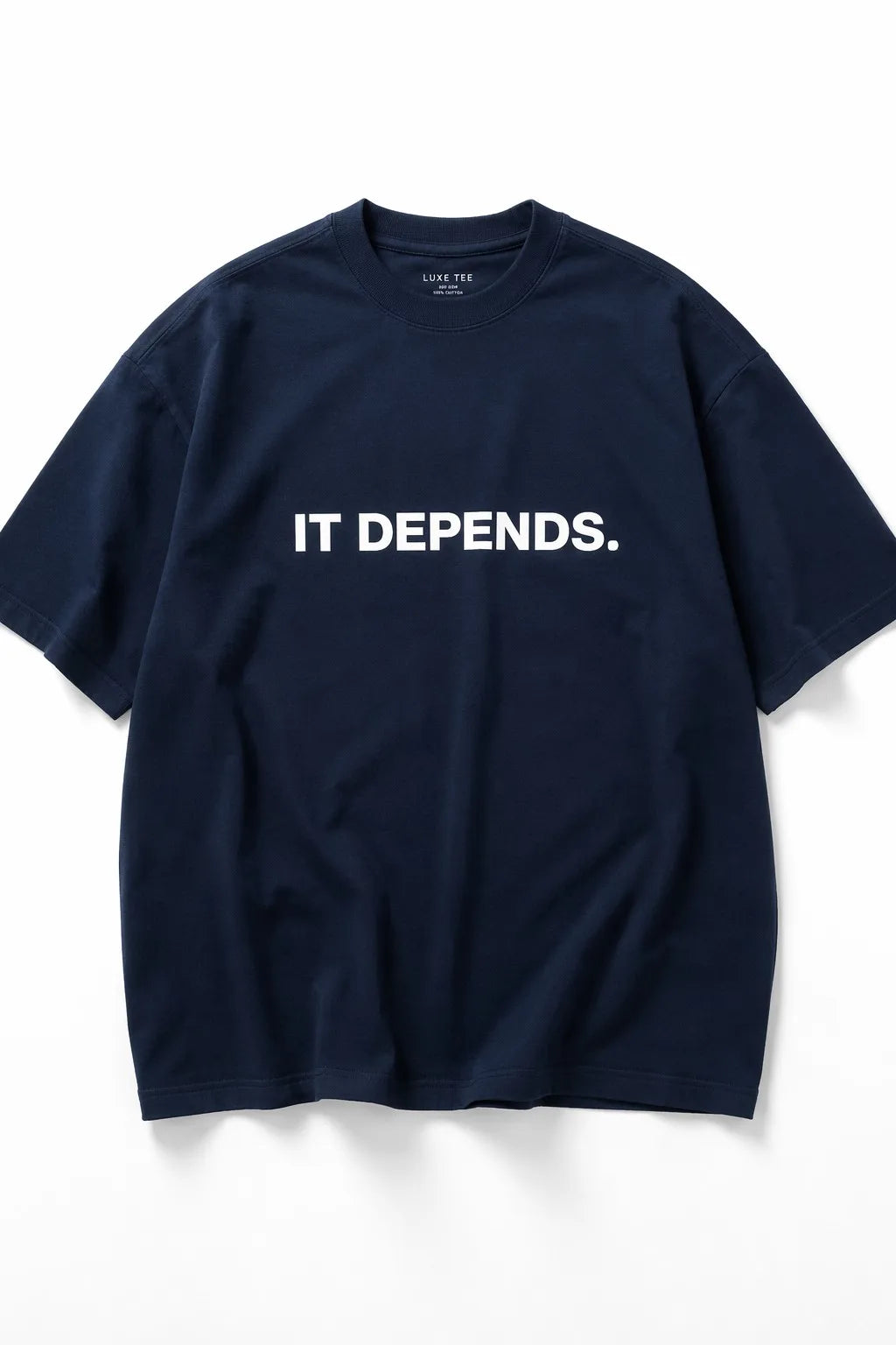 IT DEPENDS. Navy tee